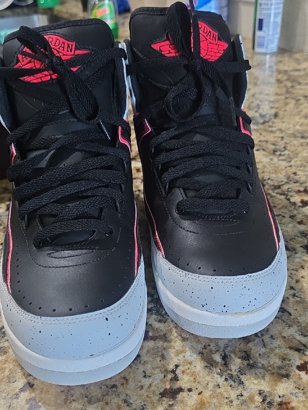 9. New Jordan Black Sneakers with Gray Toe and Pink Accents